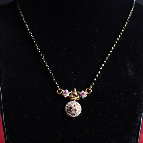 22 Carat Gold Black Beads With Pink And White Stoned Laxmi Locket Mangalsutra 9.71g by Mahita Collections