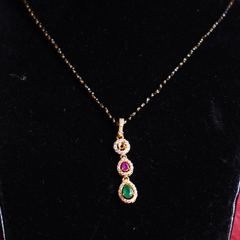 22 Carat Gold Black Beads With PinkGrean And White Stone Locket Mangalsutra 6.1g by Mahita Collections