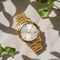 Titan Quartz Analog with Day and Date Champagne Dial Stainless Steel Strap Watch for Men (Model 1644YM01)