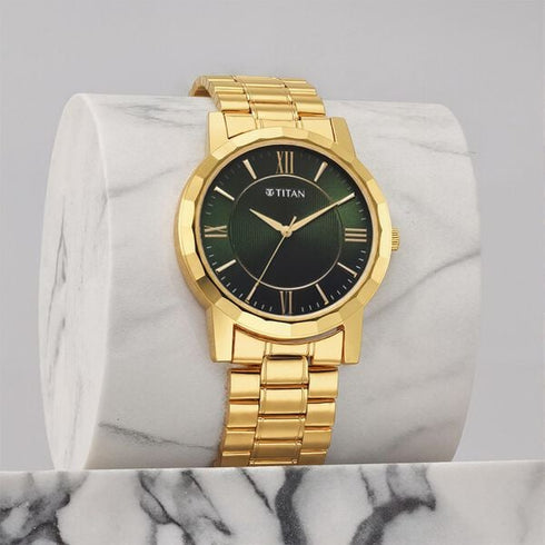 Titan Quartz Analog with Day and Date Champagne Dial Stainless Steel Strap Watch for Men (Model 1644YM05)