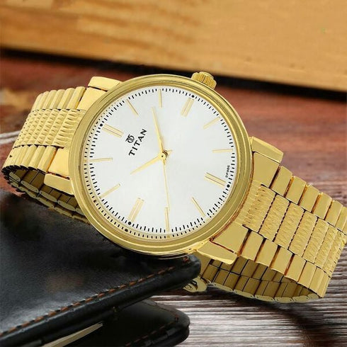 Titan Quartz Analog Silver Dial Golden Stainless Steel Strap Watch
