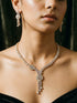 Gold Toned White AD Zircon Knotted Statement Pendant Jewellery Set
