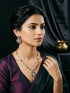 Gold Plated Nav Ratna Zircon Studded Temple Pendant Jewellery Set