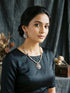 Gold Plated Nav Ratna Zircon Studded Temple Pendant Jewellery Set