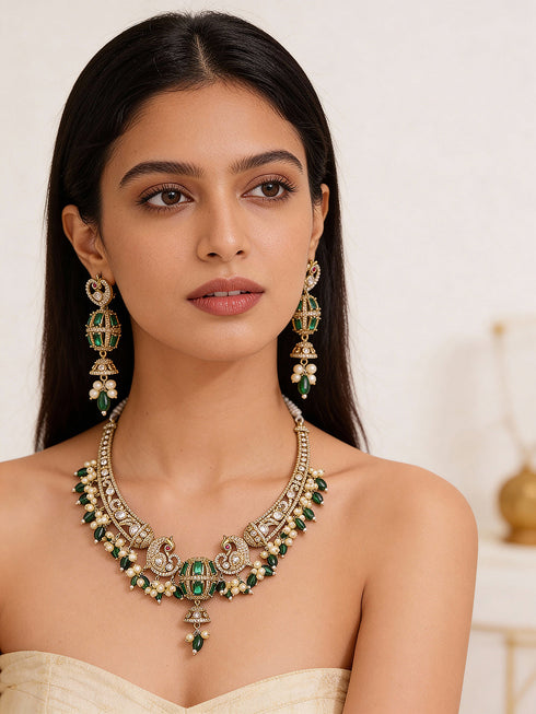 Antique Gold Plated Green Emerald AD & Kundan Studded Temple Peacock Motif Choker Jewellery Set