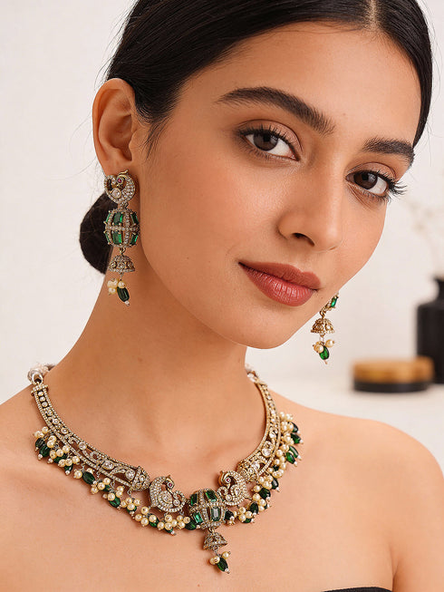 Antique Gold Plated Green Emerald AD & Kundan Studded Temple Peacock Motif Choker Jewellery Set