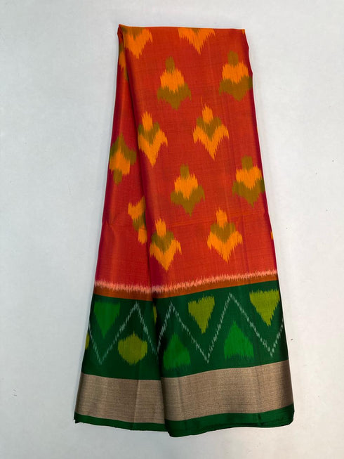 Prakruthi Swarnam Orange with Forest Green Double Warp Handloom Pochampally Ikkat Deisgn with Tie and Dye Concept Handloom Soft Silk Saree