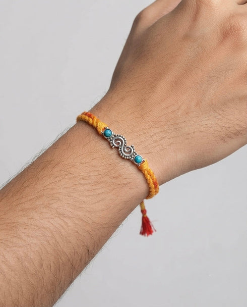 Turquoise Infinity Watch Charm Rakhi
