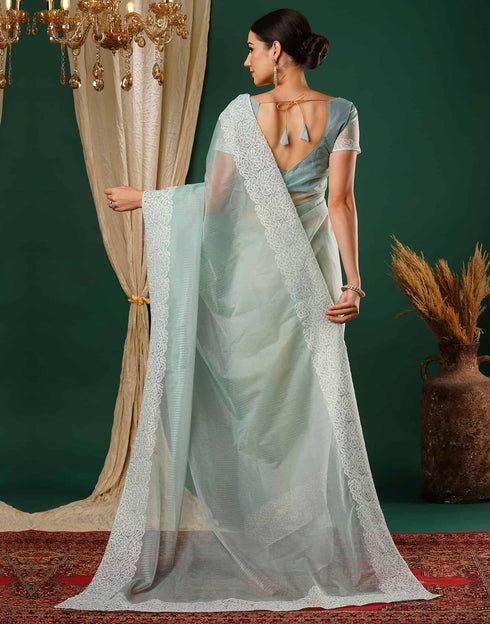 Sudathi Light Turquoise Embroidery Net Saree