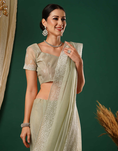Sudathi Light Pista Green Embroidery Net Saree