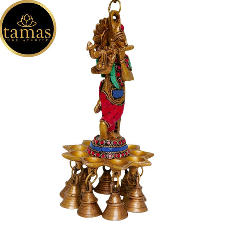 Tamas Brass Krishna Wall Hanging Diya Oil Lamp With Bells (Multicolor)
