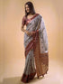 Vasthrlay Cream Maroon Abstract Print Polyester Saree With Antique Zari Border And Unstitched Blouse Piece