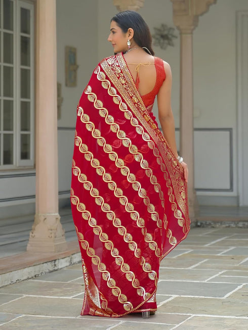 Vasthrlay Georgette Printed Orange Saree