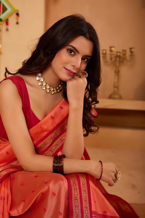 Vasthrlay Orange Jacquard Unstitched Saree