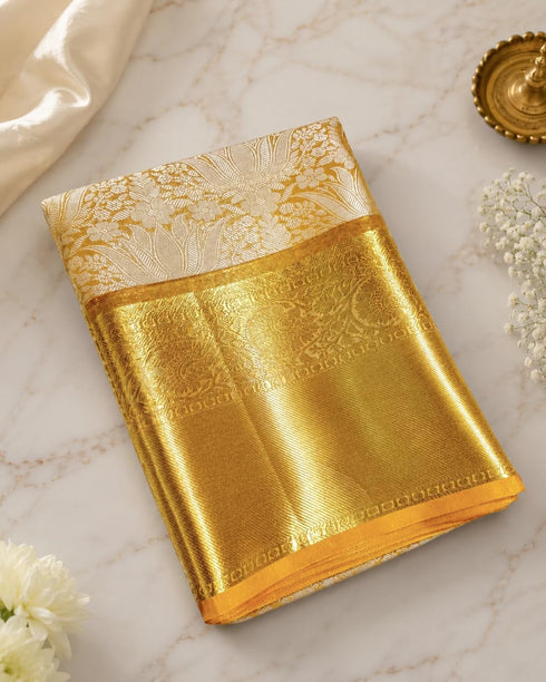 Vasthrlay Banarasi Kanjivaram Tissue Silk Cream and Gold Woven Zari Border Saree