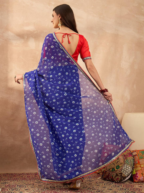 Vasthrlay Vasthrlaywomensbluegeorgettebandhaniprintembroideredlaceworksareewithunstitchedblousepiece Sareeforwoman Designersareeforwomen Tr Ethnic Wear
