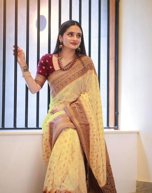 Vasthrlay Banarasi Jacquard Beige And Golden Saree With Red Unstitched Blouse Piece