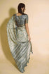 Vasthrlay Steel Grey Beige Geometric Triangle Print Polyester Saree With Muted Gold Zari Border And Teal Blue Ruched Unstitched Blouse Piece