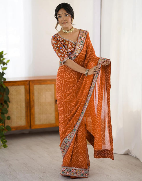 Vasthrlay Georgette Bandhani Orange Saree With Unstitched Blouse Piece