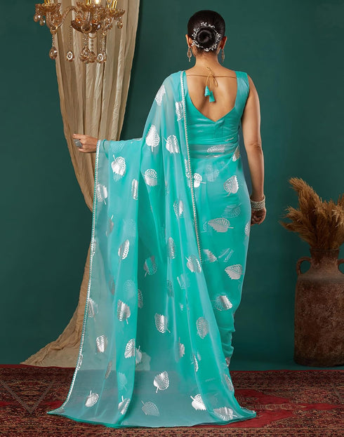 Vasthrlay Georgette Printed Turquoise Saree With Unstitched Blouse Piece