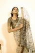 Vasthrlay Off White Textured Polyester Saree With Kalamkari Floral Panel| Zari Border And Unstitched Blouse Piece