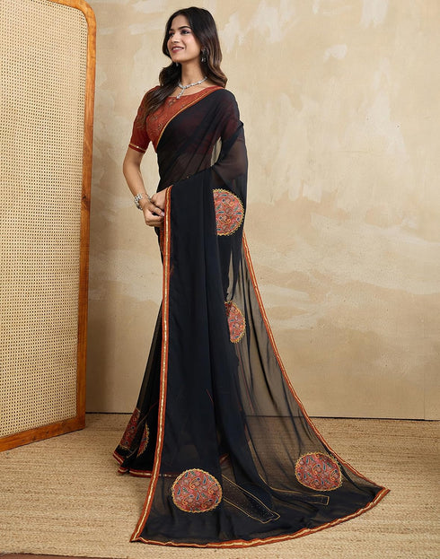 Vasthrlay Georgette Bandhani Black And Rust Saree With Unstitched Blouse Piece