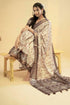 Vasthrlay Cream Terracotta Abstract Print Polyester Saree With Zari Border And Unstitched Blouse Piece