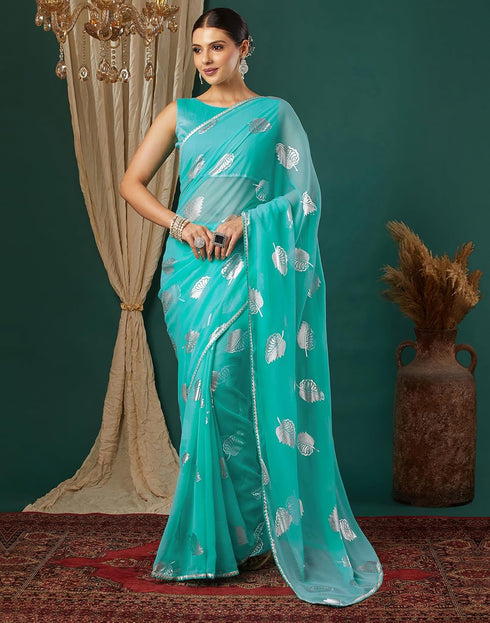 Vasthrlay Georgette Printed Turquoise Saree With Unstitched Blouse Piece