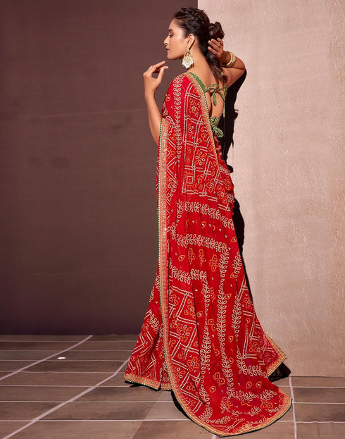 Vasthrlay Georgette Embroidery Light Red Saree With Green Unstitched Blouse Piece
