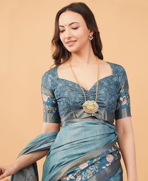 Vasthrlay Teal Blue Textured Polyester Saree With Kalamkari Floral Border And Ruched Unstitched Blouse Piece