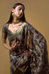 Vasthrlay Slate Grey Patchwork Print Polyester Saree With Zari Border And Unstitched Blouse Piece