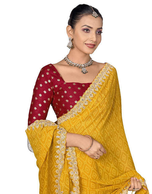 Vasthrlay Georgette Embroidery Yellow Saree With Red Unstitched Blouse Piece
