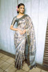 Vasthrlay Smoky Blue Abstract Floral Polyester Saree With Zari Border And Ruched Unstitched Blouse Piece