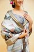 Vasthrlay Grey Mauve Geometric Triangle Print Polyester Saree With Muted Gold Zari Border And Teal Blue Ruched Unstitched Blouse Piece