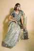 Vasthrlay Steel Grey Beige Geometric Triangle Print Polyester Saree With Muted Gold Zari Border And Teal Blue Ruched Unstitched Blouse Piece