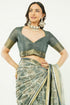Vasthrlay Charcoal Grey Abstract Print Polyester Saree With Antique Zari Border And Unstitched Blouse Piece