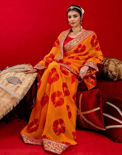 Vasthrlay Bandhani Embroidery Unstitched Orange Saree