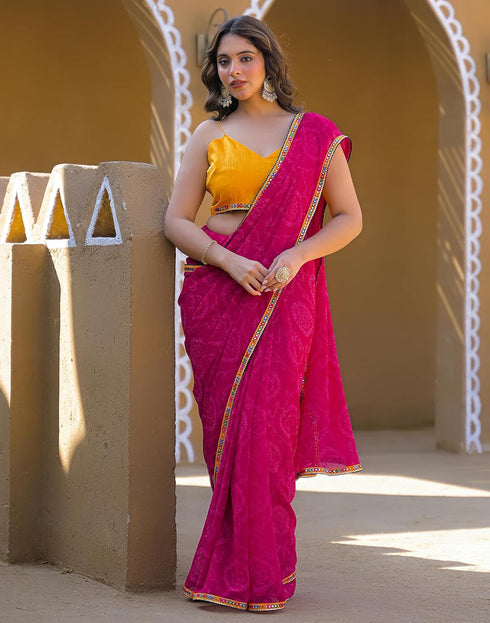 Vasthrlay Georgette Bandhani Rani Pink Saree With Yellow Unstitched Blouse Piece