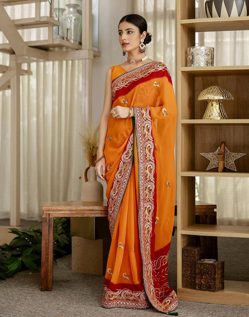 Vasthrlay Georgette Embroidery Turmeric Yellow Saree With Unstitched Blouse Piece