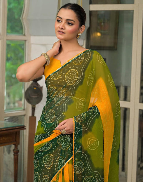 Vasthrlay Georgette Bandhani Green Saree With Yellow Unstitched Blouse Piece