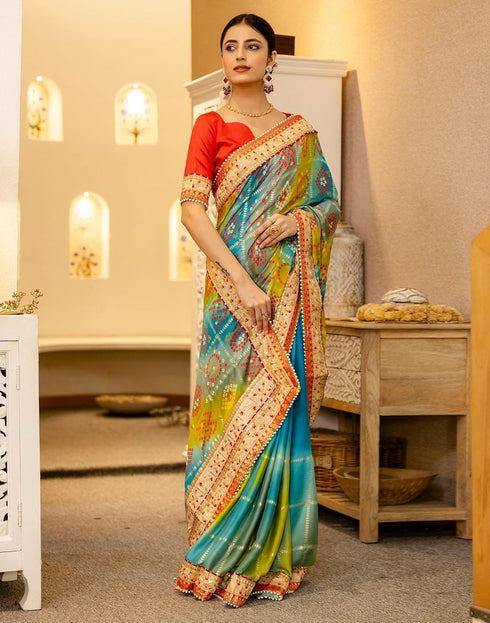 Vasthrlay Bandhani Embroidery Unstitched Teal Saree