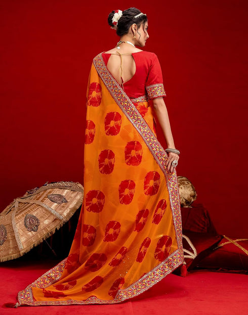 Vasthrlay Bandhani Embroidery Orange Saree With Red Unstitched Blouse Piece