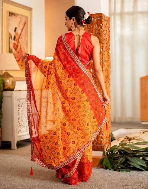 Vasthrlay Georgette Embroidery Yellow And Red Saree With Orange Unstitched Blouse Piece