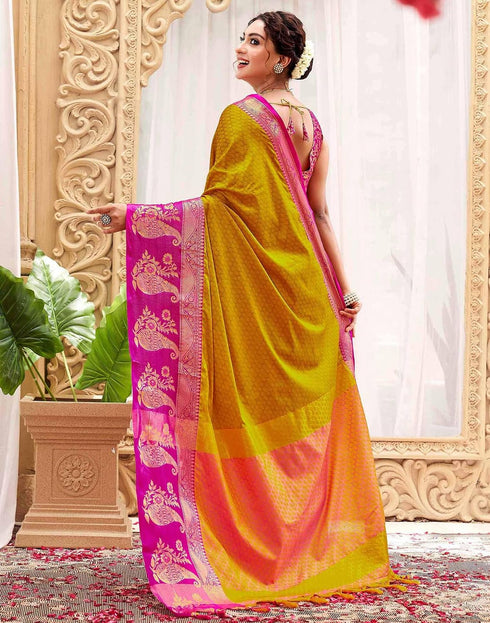 Vasthrlay Banarasi Jacquard Yellow Saree With Pink Unstitched Blouse Piece
