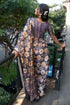 Vasthrlay Mauve Geometric Triangle Print Polyester Saree With Muted Gold Zari Border And Teal Blue Ruched Unstitched Blouse Piece