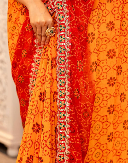 Vasthrlay Georgette Embroidery Yellow And Red Saree With Orange Unstitched Blouse Piece