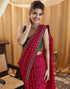 Vasthrlay Georgette Bandhani Rani Pink Saree With Green Unstitched Blouse Piece