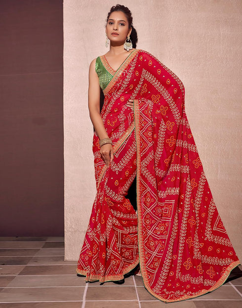Vasthrlay Georgette Embroidery Light Red Saree With Green Unstitched Blouse Piece