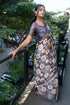 Vasthrlay Mauve Geometric Triangle Print Polyester Saree With Muted Gold Zari Border And Teal Blue Ruched Unstitched Blouse Piece