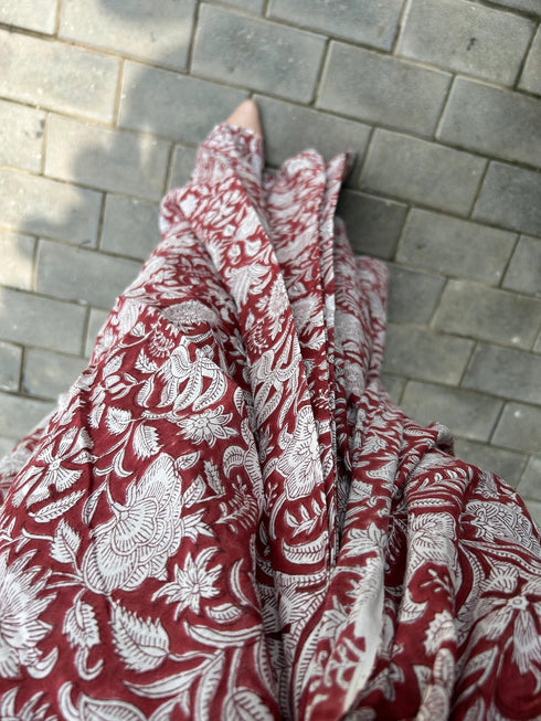 Vasthrlay Maroon Printed Unstitched Saree